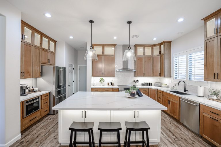 Kitchen remodel with white island
